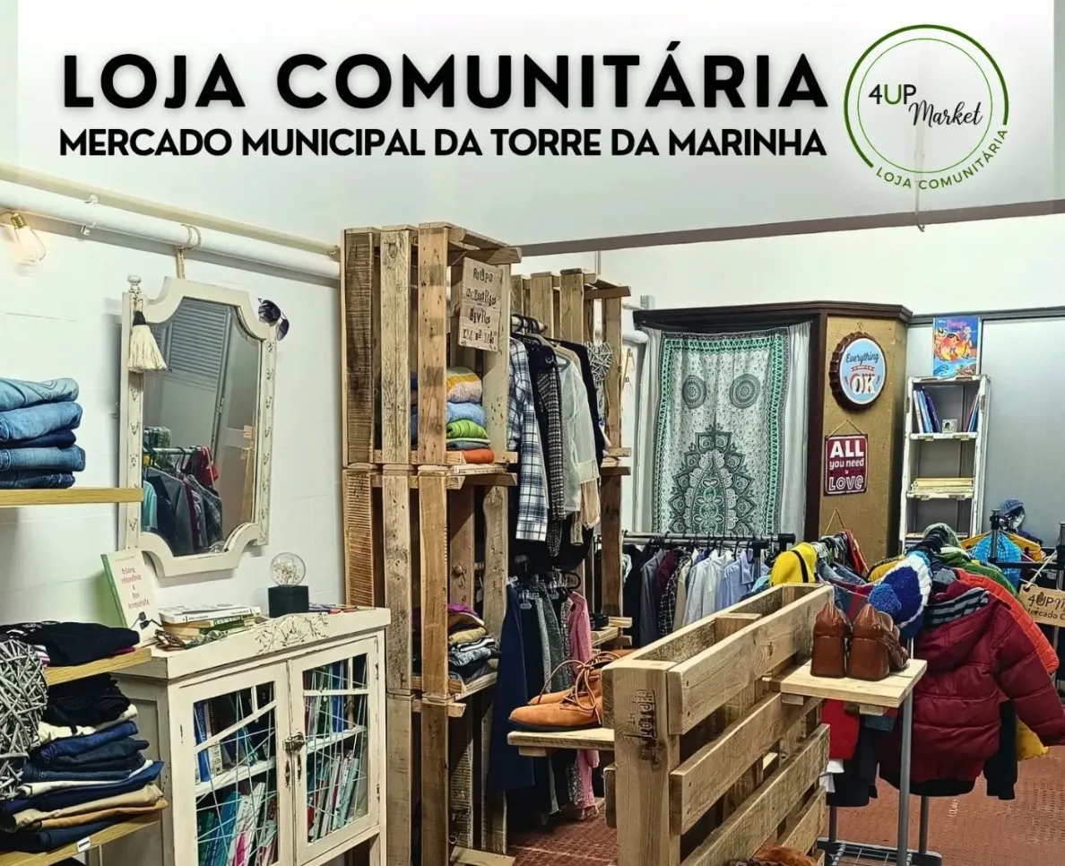 Inside the 4UP Market Community Shop at the Torre da Marinha municipal market, with clothes, shoes and books